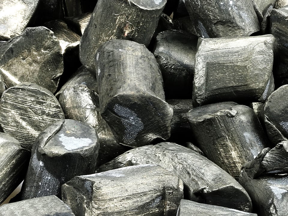 Lithium in its metal form as chunks