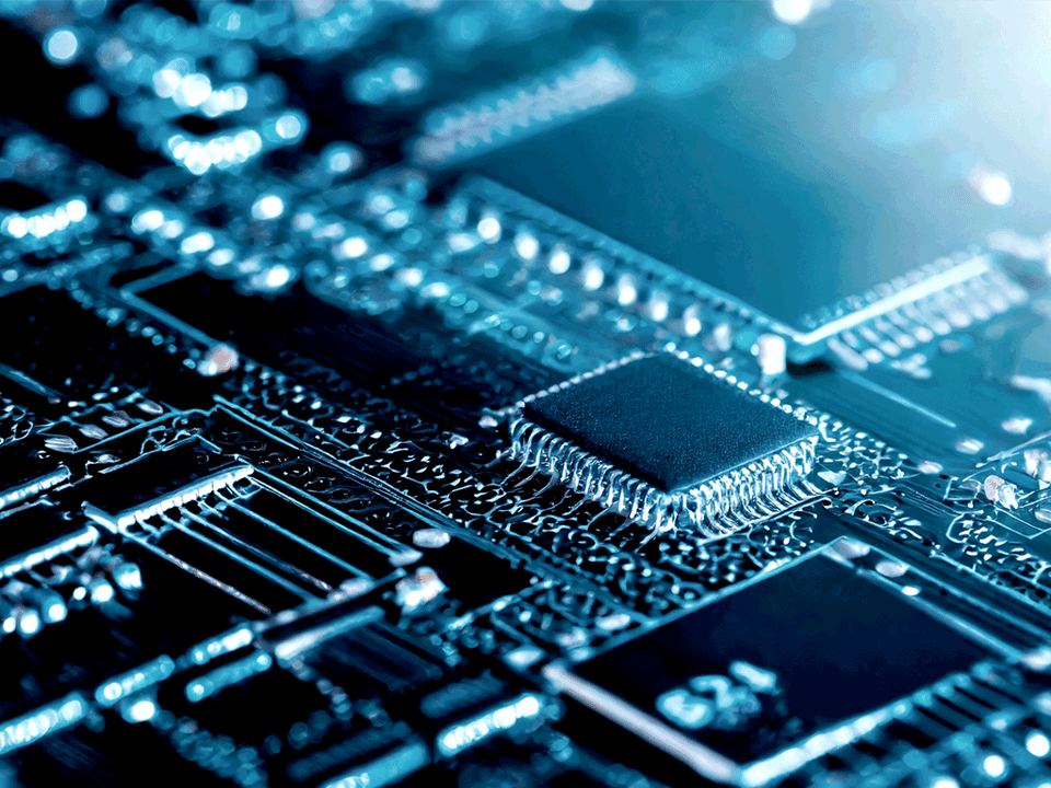 Zoomed in image of a computer chip in blue lighting
